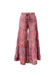 Devï Studios SARL pantalon Oriane en pashmina rose et violet avec motif cachemire, taille élastiquée et jambes évasées à volants.