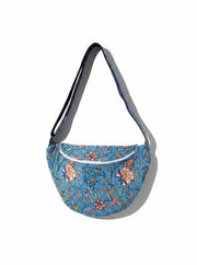 Devï Studios SARL Sac banane Elise en coton bleu imprimé floral, idéal pour le quotidien et les voyages.