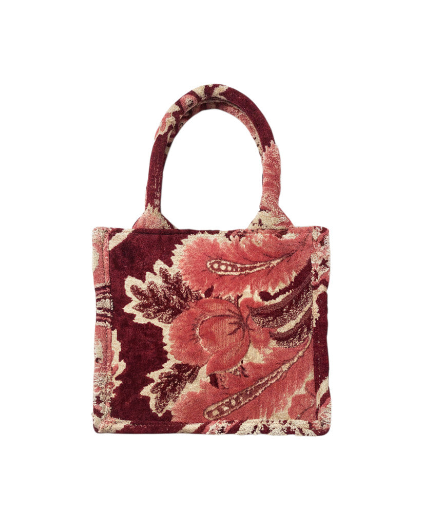 Sac à main Devï Studios SARL en velours bordeaux et rose avec motif floral abstrait, fait à la main à partir de textiles vintage.