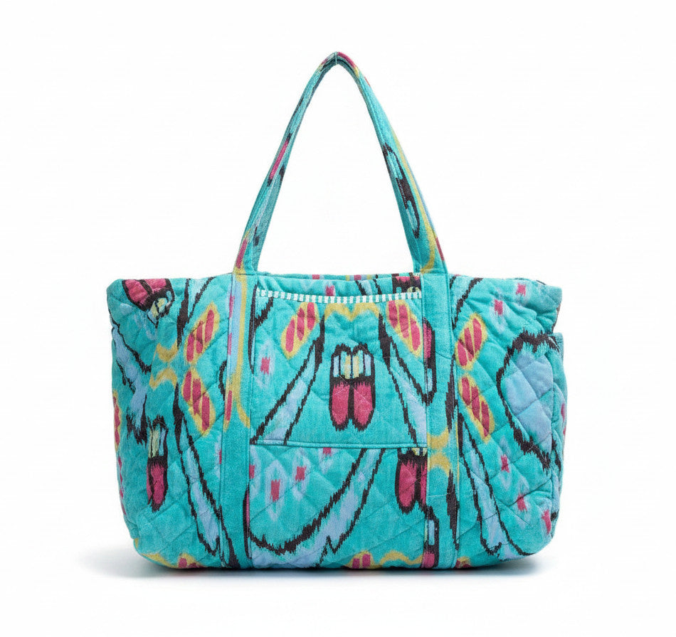 Devï Studios SARL Sac de voyage en velours et coton bleu sarcelle avec imprimé abstrait multicolore, idéal pour le week-end.
