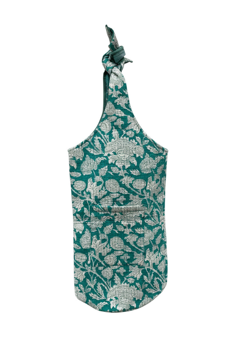 Sac de yoga en coton Devï Studios SARL, imprimé floral bleu sarcelle et blanc, avec poche avant et anse nouée réglable.