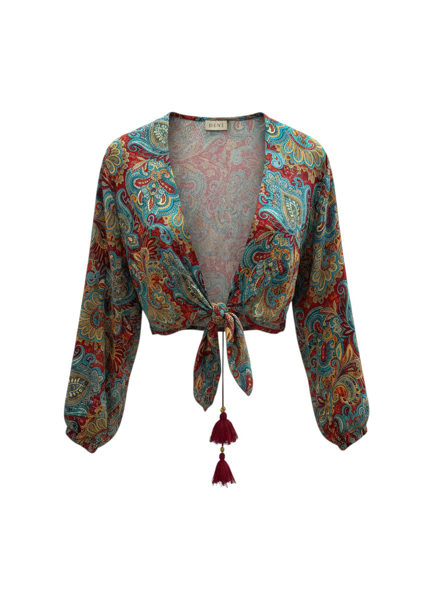 Top cache-cœur Devï Studios SARL en soie et viscose, motif cachemire rouge et turquoise, noué à l'avant avec des pompons.
