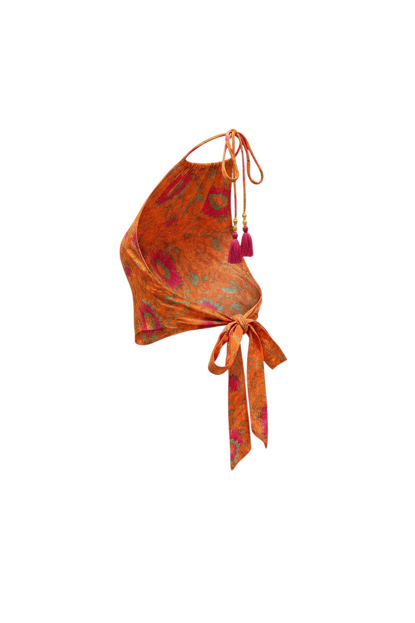 Top Freya orange imprimé floral Devï Studios SARL en soie et viscose, noué sur le devant avec des pompons.