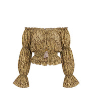Top Sari Nora Devï Studios SARL jaune et marron à imprimé ethnique, col Bardot, manches longues bouffantes et volantées, corsage élastiqué et finitions à fronces.