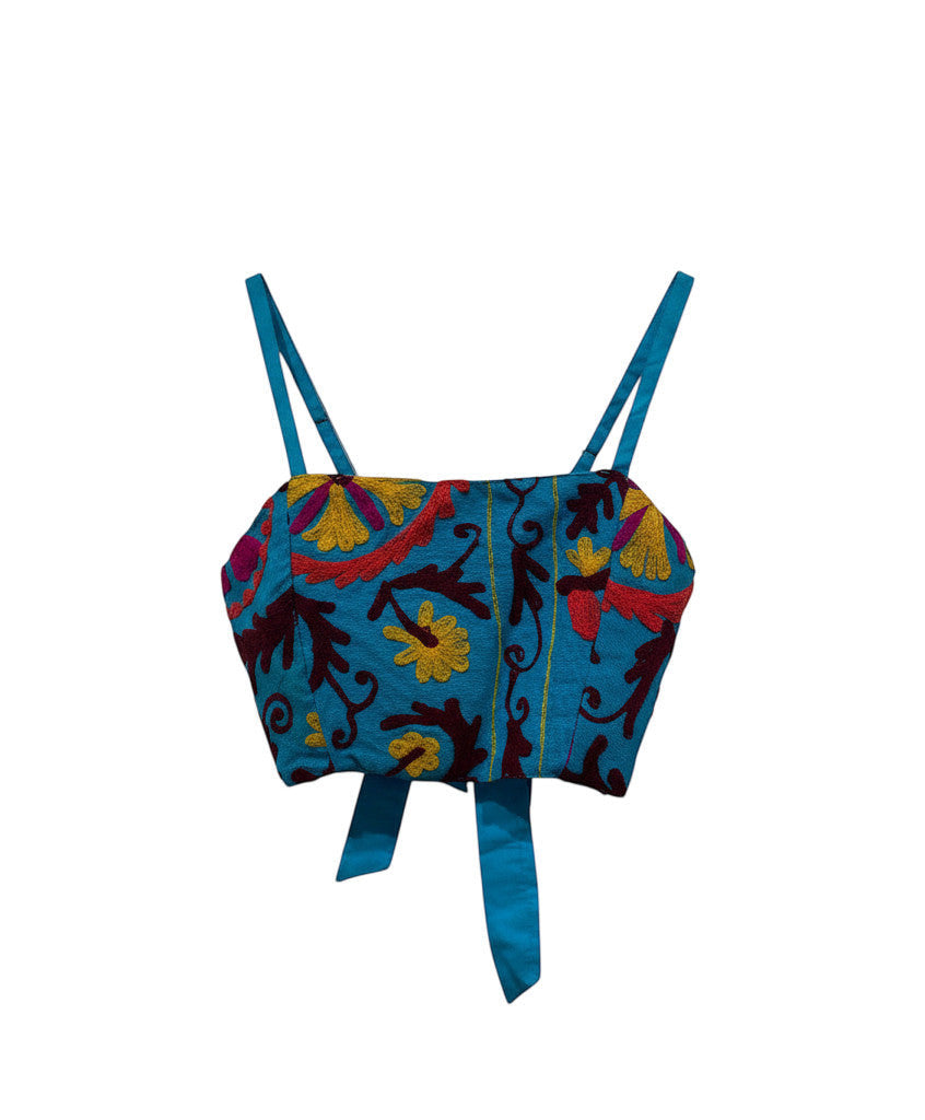 Devï Studios SARL top Pipa bleu turquoise avec broderies florales multicolores, coton, style bandeau ajustable.