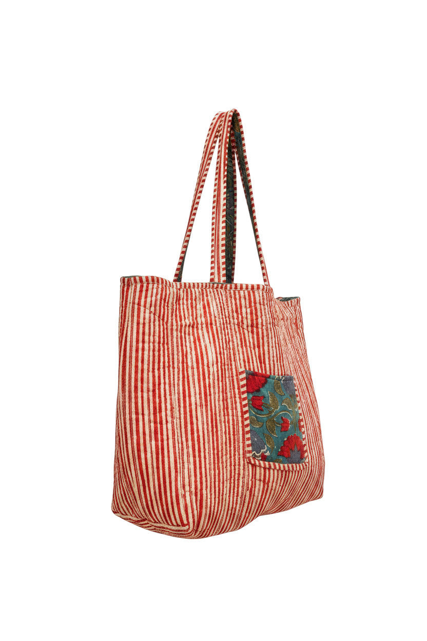 Devï Studios SARL tote bag en coton réversible à rayures rouges et blanches avec une poche à imprimé floral bleu sarcelle