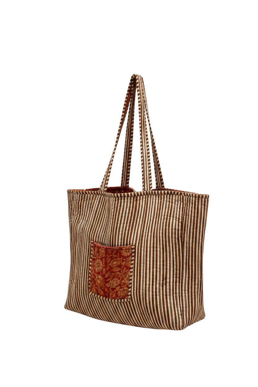 Tote bag Devï Studios SARL en coton réversible, rayures marron et blanc, poche avant imprimée florale rouge.